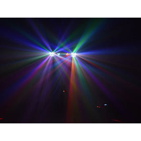 Eurolite LED KLS-120 FX ljusset som projicerar färgade ljusstrålar i blått, grönt, rött och lila i mörk miljö.